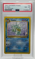 1999 POKEMON FOSSIL #42 SEADRA 1ST EDITION PSA 8 NM-MT