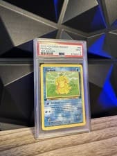 2000 POKEMON Team Rocket PSYDUCK #65 1st EDITION PSA 9