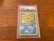 Pokémon 1999 Fossil Psyduck 53/62 1st Edition Common PSA 9 English TCG