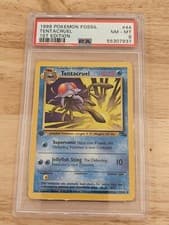 1999 Pokémon Pokemon Fossil 1st Edition #44 TENTACRUEL PSA 8 NM-MT